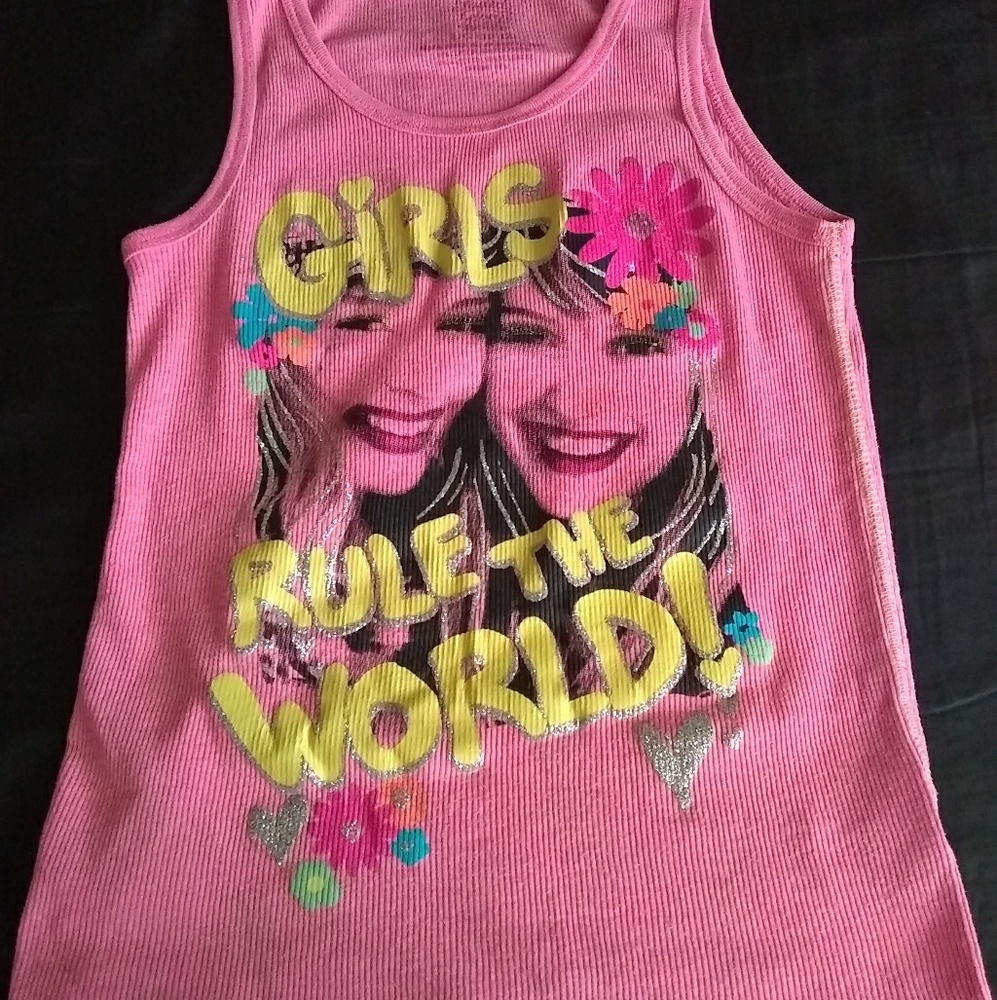 A pink shirt with yellow .